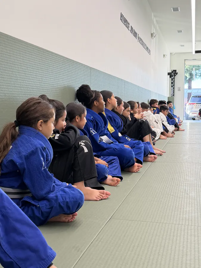 Kids class lined up along the wall